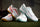 Mizuno Wave Lynx 2 Hockey Shoes White/Fiery Coral/Citrus 25/26 | ONE Sports Warehouse