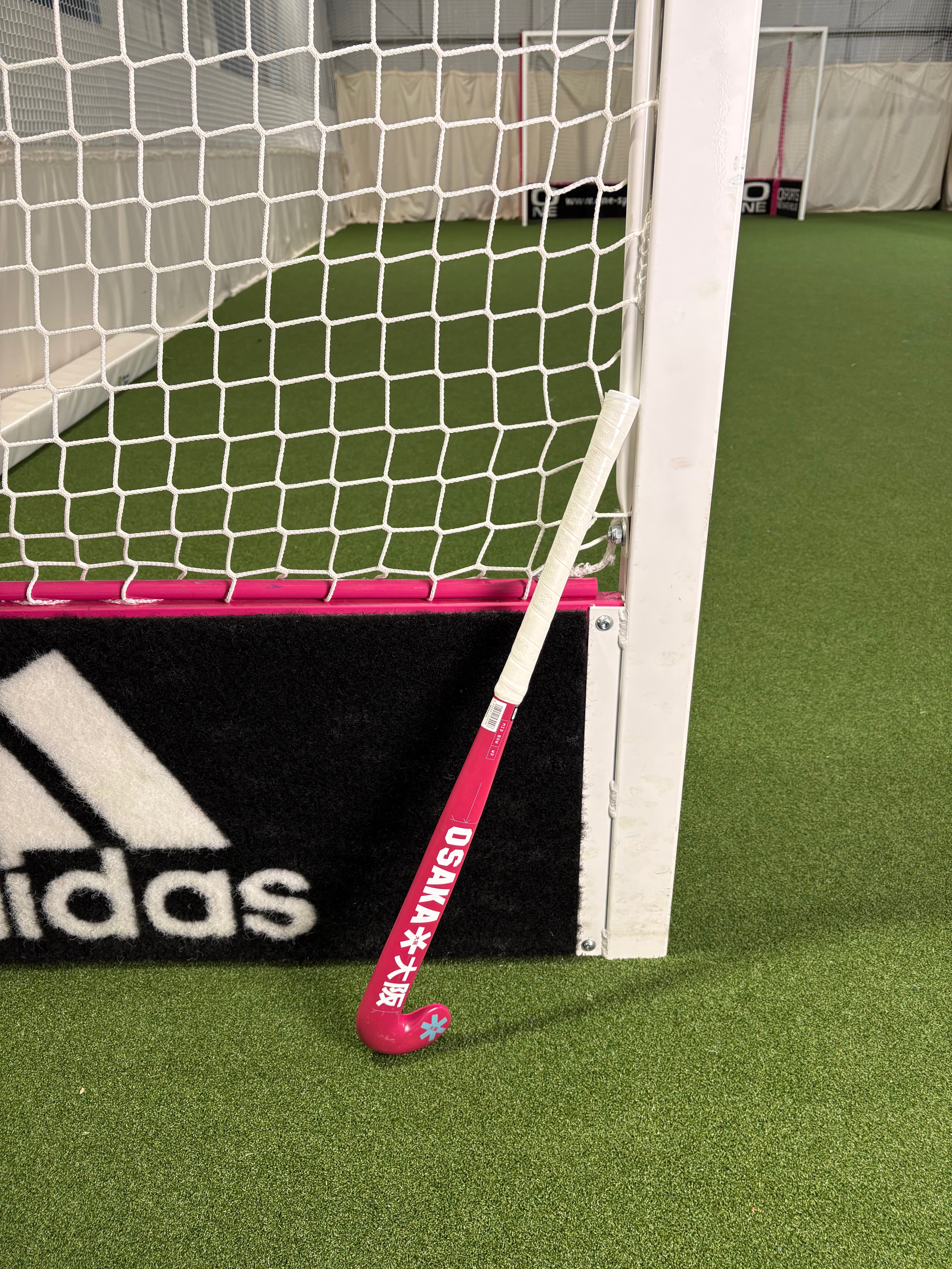 Osaka Mid Bow WD Raspberry Junior Hockey Stick Ex-Demo | ONE Sports Warehouse