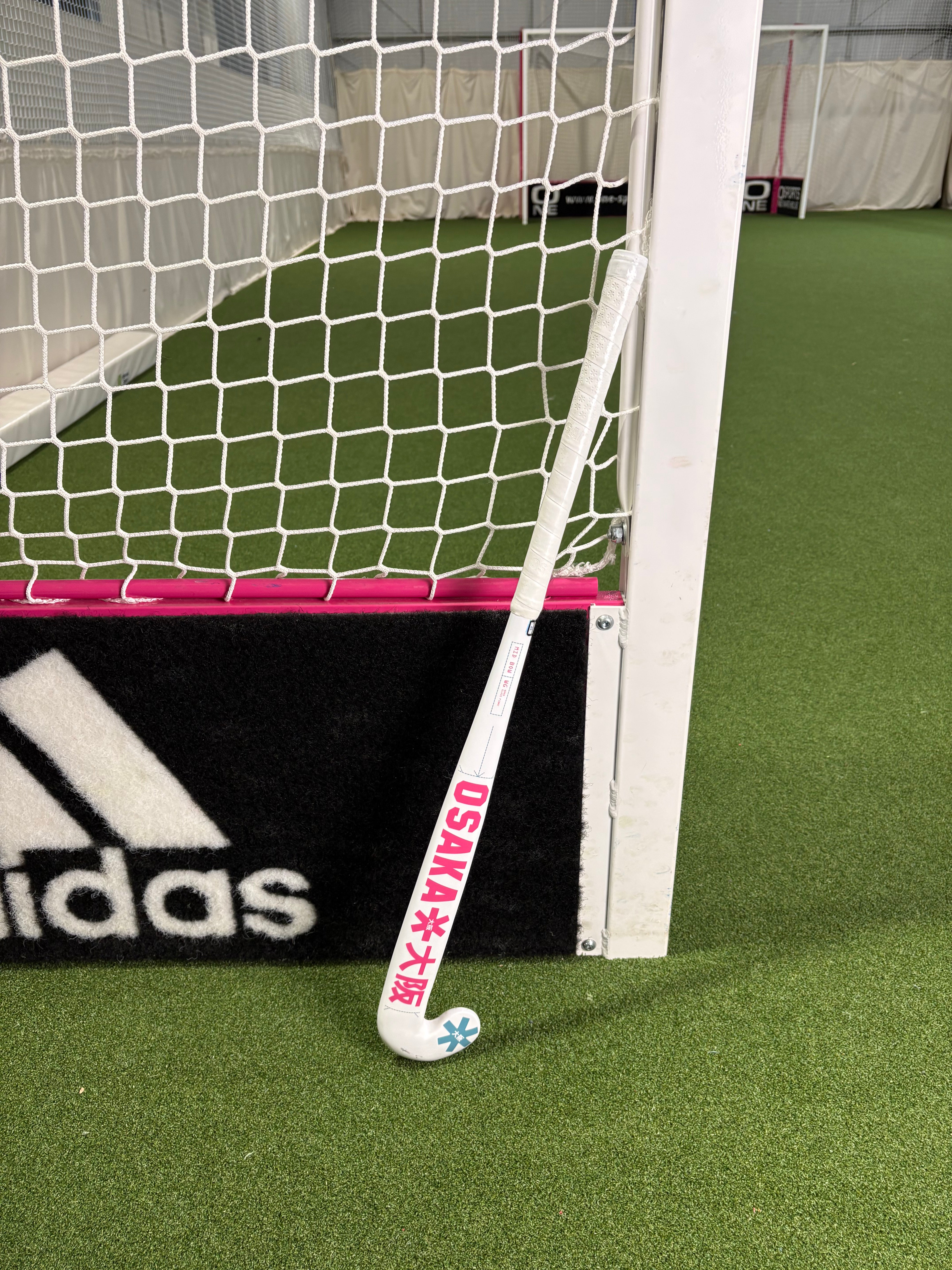 Osaka Mid Bow WG Raspberry Junior Hockey Stick Ex-Demo | ONE Sports Warehouse